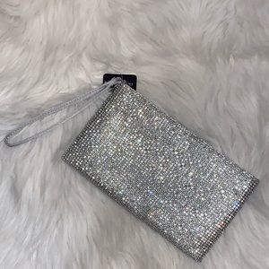 Gorgeous NWT silver bling evening bag with zip top closure and wrist strap